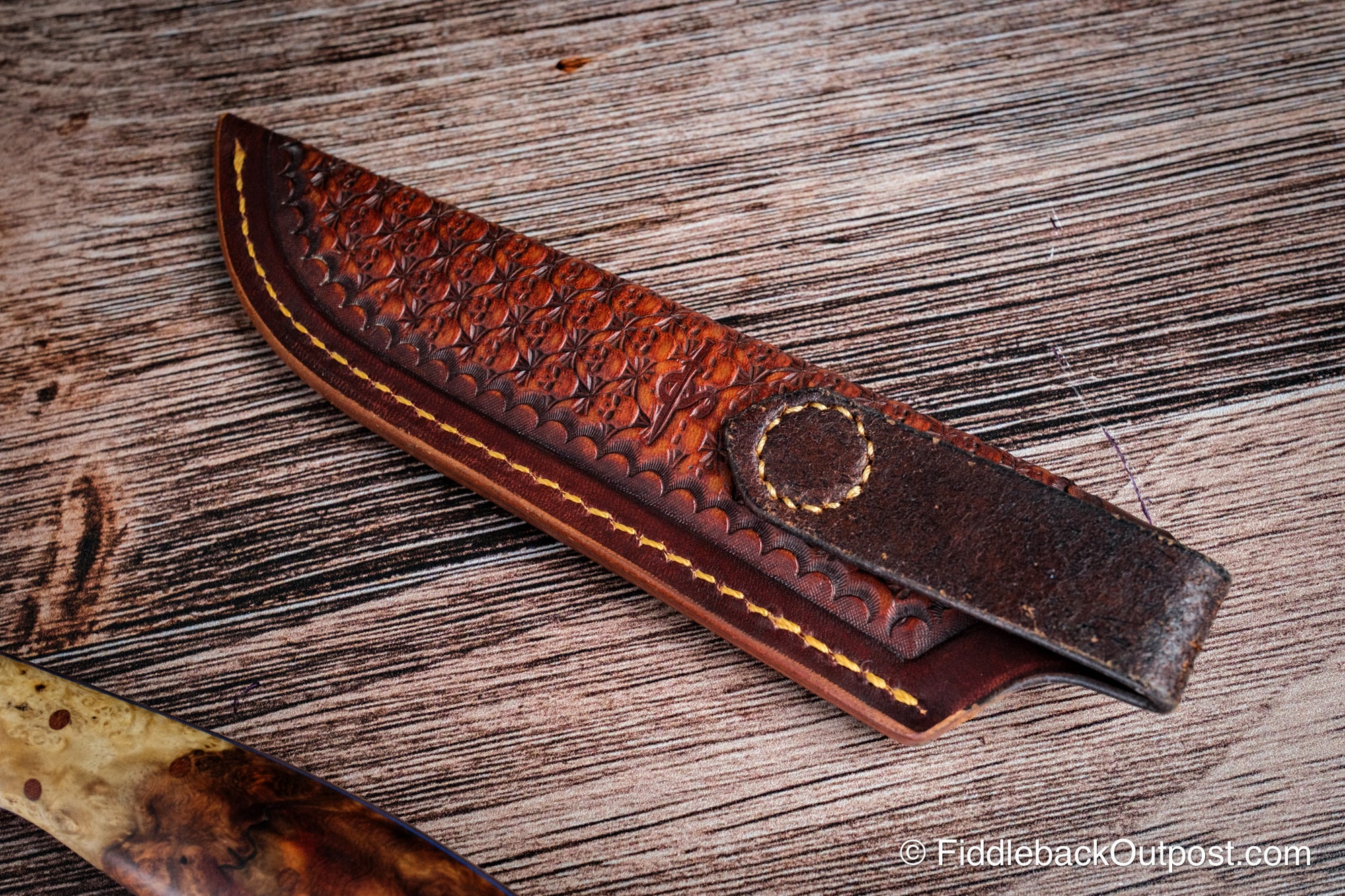 Diomedes Industries Traditional 728 - Leather Belt Sheath - Custom Burial Ground Skull Tooling